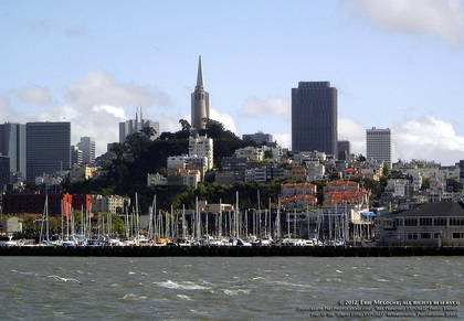 Waterfront picture of San Francisco skyline with sailboats at Pier 39. Special Effects picture of the San Francisco skyline in 180 degrees, photographed and created by Steven Shapall. Part of the online artistic photography exhibit, 