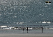 Artistic picture of silhouetted people on the beach in the late afternoon.© 2011, FreePhotoCourse.com, all rights reserved.  Awesome beach pictures & wallpapers. Download free jpg, jpeg photos.  