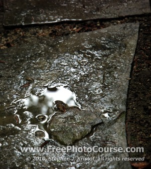Fresh Rain on Stone with Reflection - Fine Art Photography - © 2010, Stephen Kristof, http://www.FreePhotoCourse.com, all rights reserved 
