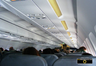 Picture of interior of a commercial airline jet. © 2011, FreePhotoCourse.com, all rights reserved.  Free high-res desktop wallpapers and pictures. 