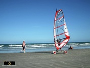 Picture of a beachside wind surfer on wheels. © 2011, FreePhotoCourse.com, all rights reserved.  Awesome beach pictures & wallpapers. Download free jpg, jpeg photos.  