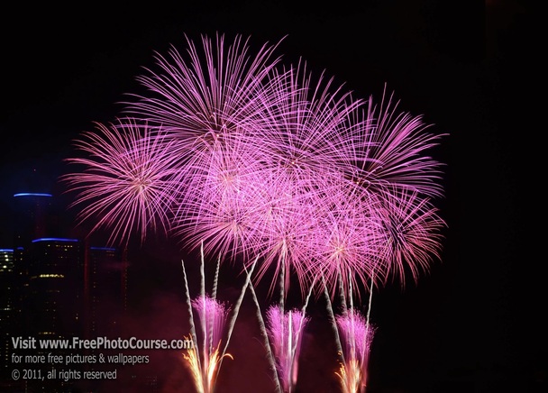 Picture of vibrant magenta fireworks;  Article about how to photograph fireworks;© 2011, Stephen Kristof for FreePhotoCourse.com  