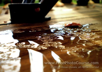 Abstract, Water Droplets, Rain, Reflection - Fine Art Photography Tips and Lessons - © 2010, Kevan Donais.  Visit www.FreePhotoCourse.com, all rights reserved 