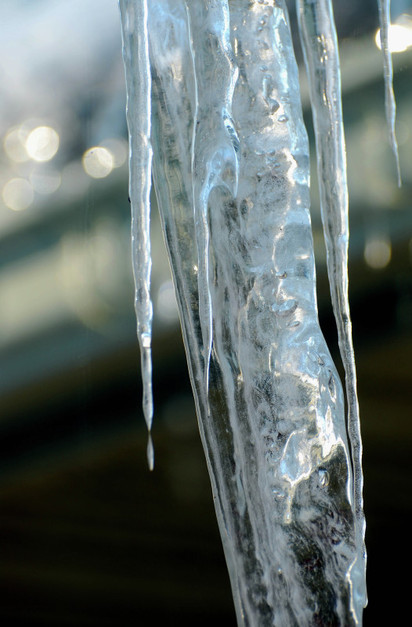 Picture of a glassy icicle; part of FreePhotoCourse.com's Winter Challenge; (c) 2011, all rights reserved