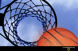 Picture of basketball going through hoop.  Free wallpapers courtesty of www.FreePhotoCourse.com