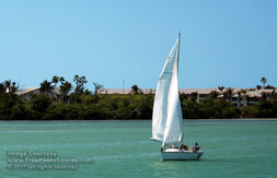 Picture of a sailboat on sub-tropical waters near Captiva Island, Florida.  Find more great all-free pictures at www.FreePhotoCourse.com. © 2011, FreePhotoCourse.com; all rights reserved. 